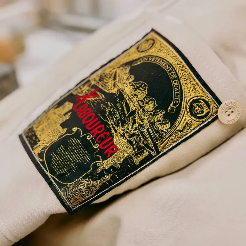 Blason Le Laboureur sur Coltin en moleskine ecru